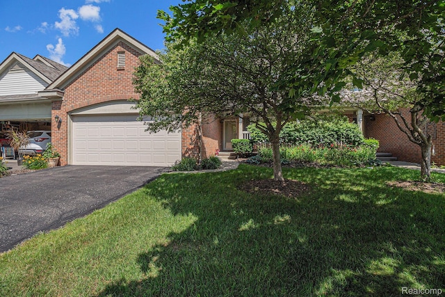 5891 Augusta Ln, Grand Blanc, MI 48439 - obstructed view of property featuring an attached garage, brick siding, driveway, and a front lawn