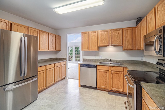 5891 Augusta Ln, Grand Blanc, MI 48439 - kitchen with stainless steel appliances and dark countertops