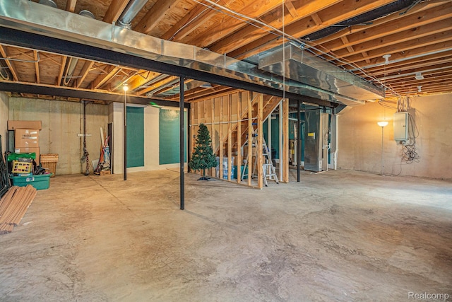 5891 Augusta Ln, Grand Blanc, MI 48439 - unfinished below grade area featuring electric panel and heating unit