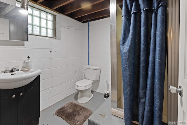 15 Forest St, River Rouge, MI 48218 - bathroom featuring vanity, concrete floors, a stall shower, and concrete block wall