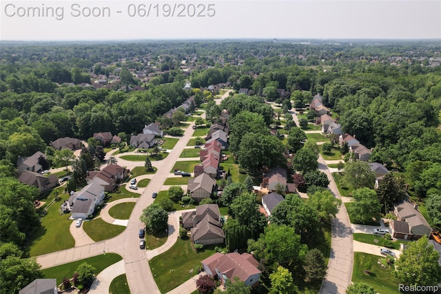 30753 Sunderland Dr, Farmington Hills, MI 48331 - aerial perspective of suburban area featuring a heavily wooded area