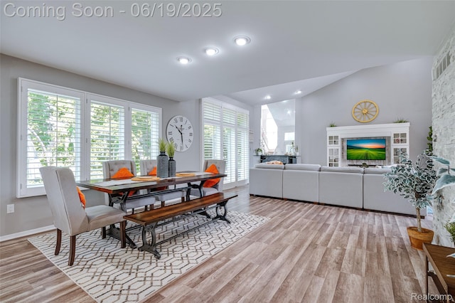 30753 Sunderland Dr, Farmington Hills, MI 48331 - dining room with light wood-style floors, vaulted ceiling, and recessed lighting