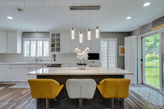 30753 Sunderland Dr, Farmington Hills, MI 48331 - kitchen featuring healthy amount of natural light, decorative backsplash, recessed lighting, and white cabinetry