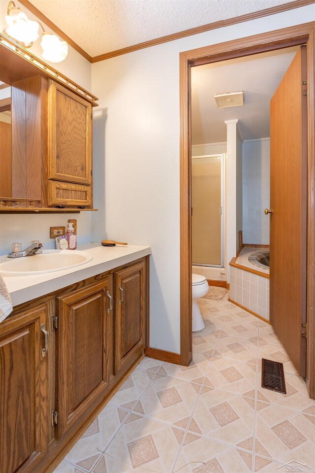 5665 N Sturgeon Rd, Midland, MI 48624 - bathroom featuring vanity, a tub, toilet, a shower stall, and baseboards