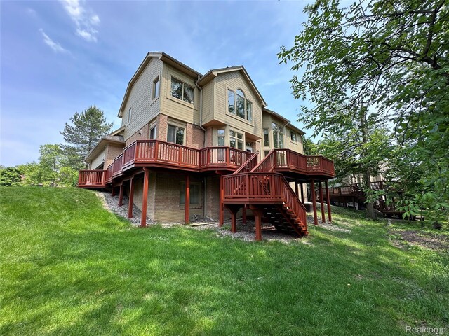 6601PEMBRIDGEHILL Pembridge Hl, West Bloomfield, MI 48322 - back of house featuring a deck, brick siding, stairway, and a yard