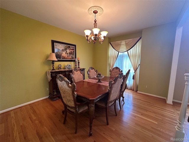 6601PEMBRIDGEHILL Pembridge Hl, West Bloomfield, MI 48322 - dining space with a chandelier, light wood-type flooring, and baseboards