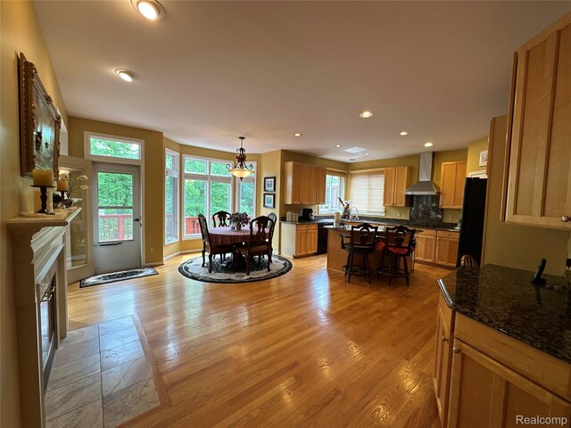 6601PEMBRIDGEHILL Pembridge Hl, West Bloomfield, MI 48322 - dining area featuring light wood-style flooring, recessed lighting, and a fireplace