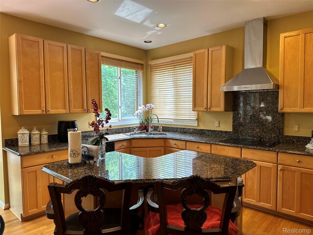 6601PEMBRIDGEHILL Pembridge Hl, West Bloomfield, MI 48322 - kitchen featuring wall chimney range hood, black electric stovetop, recessed lighting, light wood-style flooring, and dark stone countertops