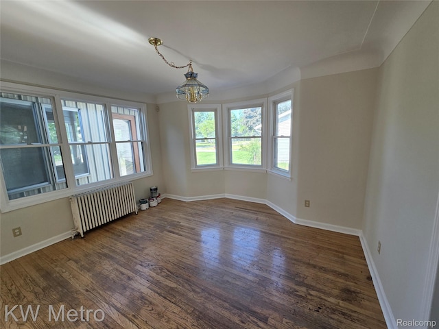 19620 Jeanette St, Southfield, MI 48075 - unfurnished room with radiator, hardwood / wood-style flooring, a chandelier, and baseboards
