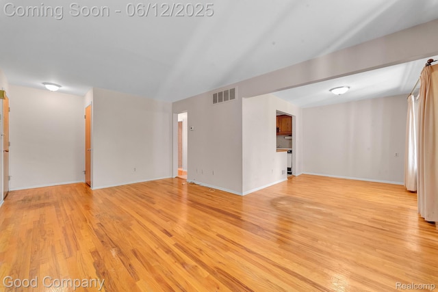 29628 Hoover Rd, Warren, MI 48093 - empty room with light wood finished floors and baseboards