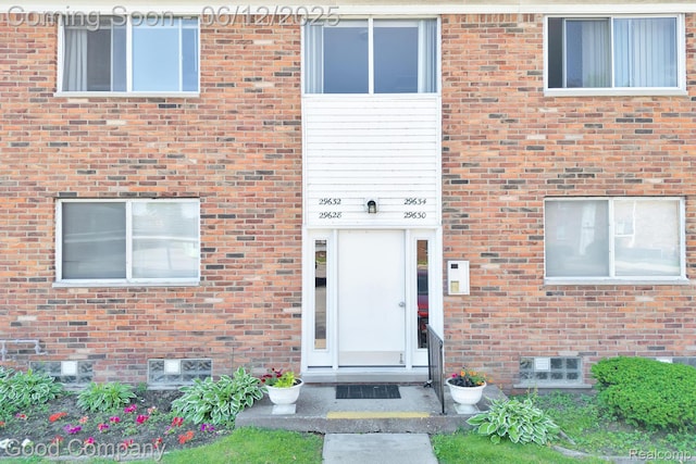 29628 Hoover Rd, Warren, MI 48093 - property entrance featuring crawl space and brick siding