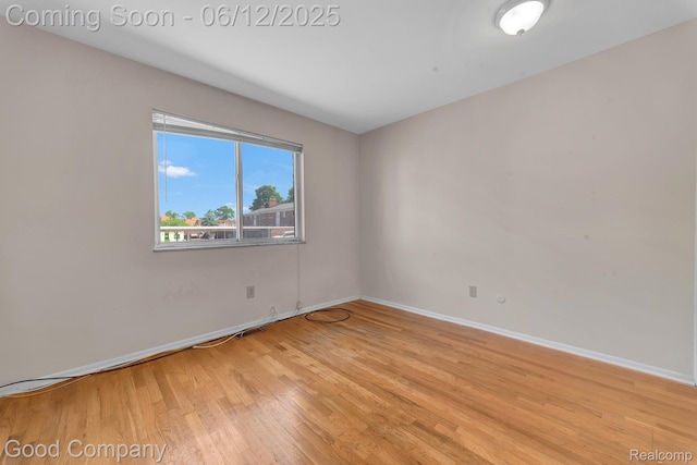 29628 Hoover Rd, Warren, MI 48093 - spare room with light wood-style floors and baseboards