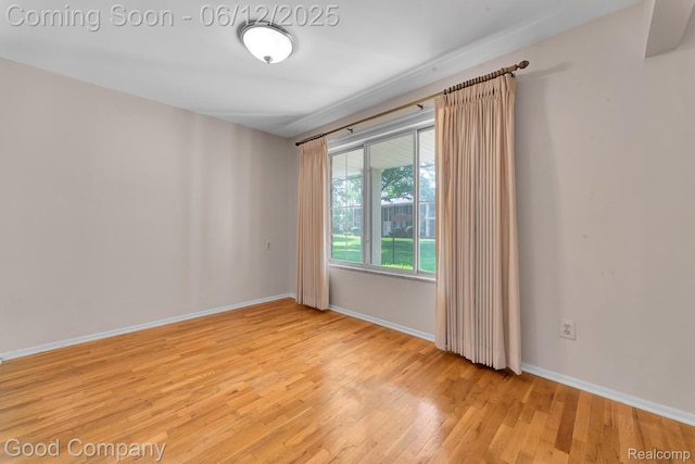 29628 Hoover Rd, Warren, MI 48093 - empty room featuring light wood finished floors and baseboards
