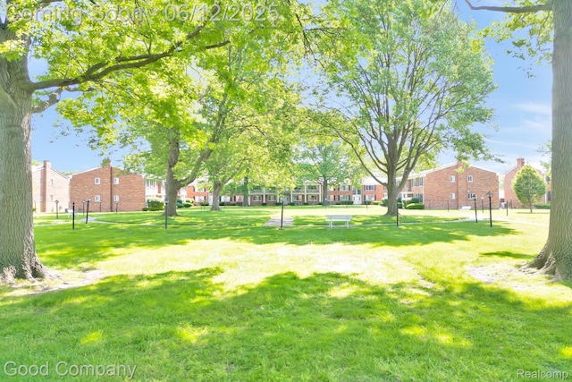 29628 Hoover Rd, Warren, MI 48093 - view of green lawn with a residential view