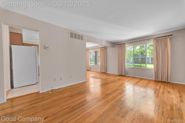 29628 Hoover Rd, Warren, MI 48093 - empty room featuring light wood finished floors