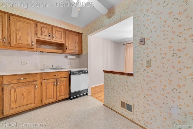 29628 Hoover Rd, Warren, MI 48093 - kitchen with dishwasher, wallpapered walls, light countertops, ceiling fan, and brown cabinets