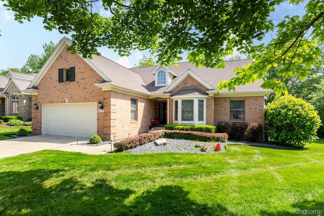 62874 Walker Ct Unit 17, Washington, MI 48094 - view of front of house featuring an attached garage, concrete driveway, a front lawn, brick siding, and a shingled roof