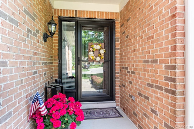 62874 Walker Ct Unit 17, Washington, MI 48094 - property entrance with brick siding