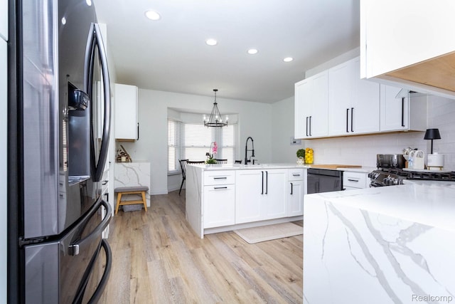 62874 Walker Ct Unit 17, Washington, MI 48094 - kitchen with refrigerator with ice dispenser, a peninsula, light wood finished floors, white cabinets, and recessed lighting