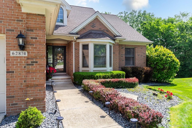 62874 Walker Ct Unit 17, Washington, MI 48094 - entrance to property with brick siding and roof with shingles
