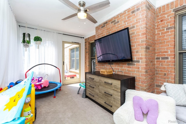 62874 Walker Ct Unit 17, Washington, MI 48094 - bedroom featuring brick wall, carpet floors, access to exterior, and a ceiling fan
