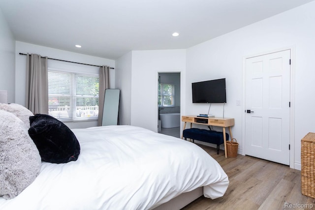 62874 Walker Ct Unit 17, Washington, MI 48094 - bedroom with light wood-type flooring and recessed lighting