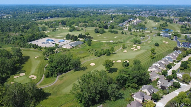 62874 Walker Ct Unit 17, Washington, MI 48094 - aerial view of property and surrounding area featuring a golf club and nearby suburban area