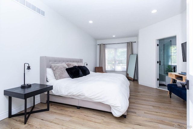 62874 Walker Ct Unit 17, Washington, MI 48094 - bedroom featuring light wood-style flooring and recessed lighting