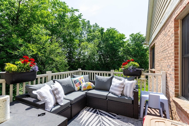 62874 Walker Ct Unit 17, Washington, MI 48094 - deck with an outdoor hangout area