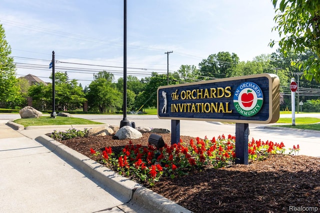 62874 Walker Ct Unit 17, Washington, MI 48094 - view of community / neighborhood sign