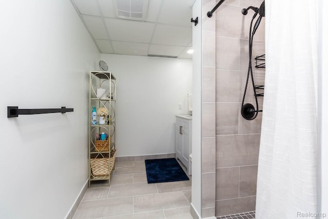 62874 Walker Ct Unit 17, Washington, MI 48094 - full bath featuring tiled shower, tile patterned flooring, vanity, and a paneled ceiling