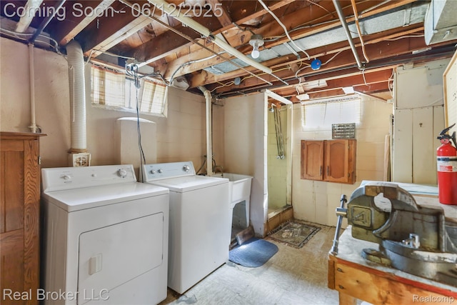 3809 Whittier Ave, Flint, MI 48506 - laundry area with washer and clothes dryer and tile patterned floors