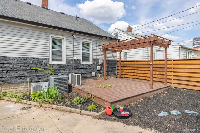 1418 E 10 Mile Rd, Ferndale, MI 48220 - deck featuring a fenced backyard, a pergola, and central AC unit