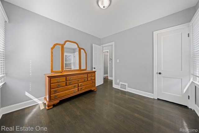 1418 E 10 Mile Rd, Ferndale, MI 48220 - bedroom featuring dark wood-type flooring and baseboards