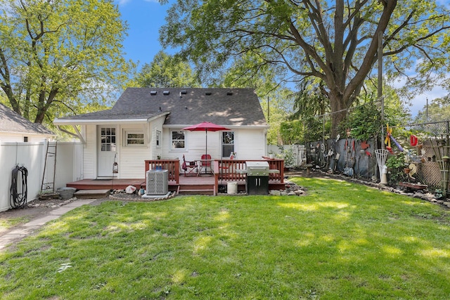 59 Wright St, Coldwater, MI 49036 - rear view of property featuring roof with shingles, a deck, and cooling unit