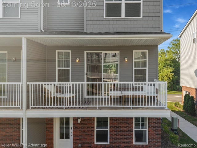 3947 Trailwaycommons Cir, Auburn Hills, MI 48326 - back of property with covered porch and brick siding