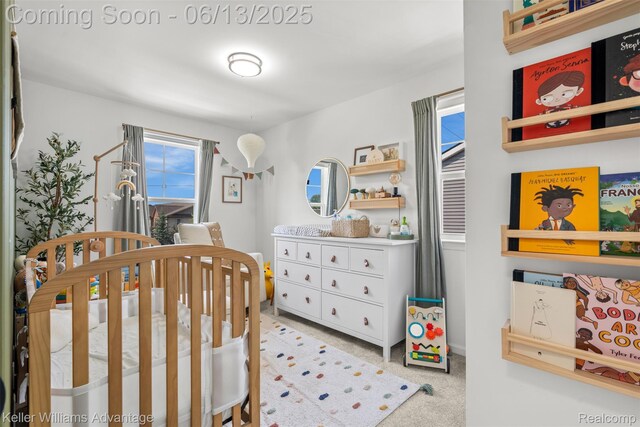 3947 Trailwaycommons Cir, Auburn Hills, MI 48326 - bedroom with carpet flooring and a crib