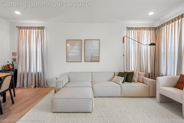 3947 Trailwaycommons Cir, Auburn Hills, MI 48326 - living area featuring wood finished floors and recessed lighting