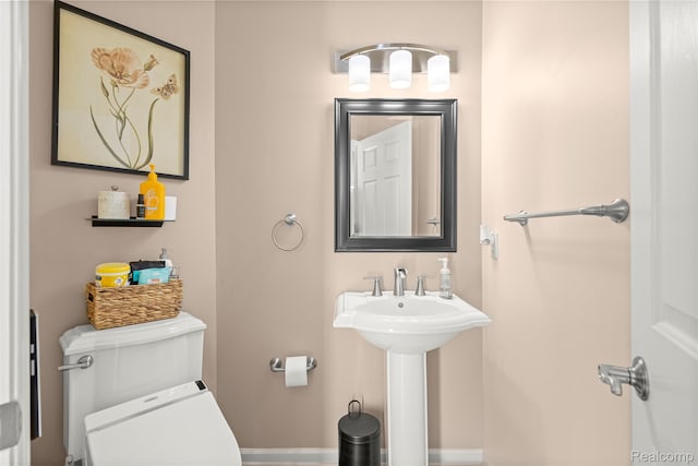 4991 Knollcrest Ct, Commerce Twp, MI 48382 - bathroom featuring toilet and a sink