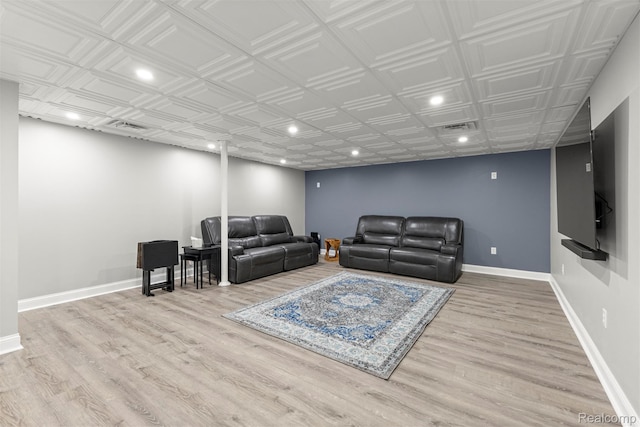 4991 Knollcrest Ct, Commerce Twp, MI 48382 - living room with recessed lighting, wood finished floors, and an ornate ceiling