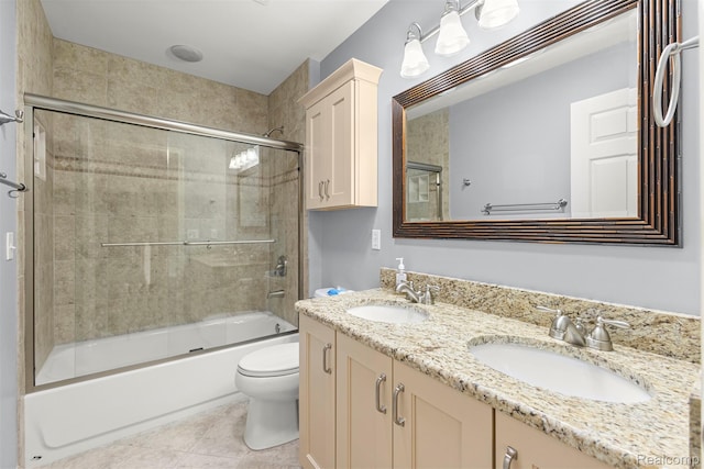 4991 Knollcrest Ct, Commerce Twp, MI 48382 - full bath featuring double vanity, bath / shower combo with glass door, and tile patterned flooring
