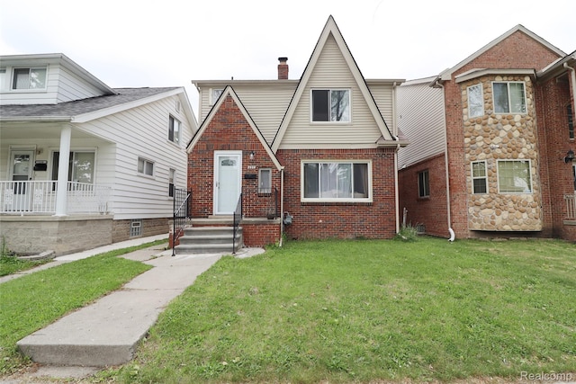7524 Williamson St, Dearborn, MI 48126 - view of front of property with a front lawn, brick siding, and a chimney