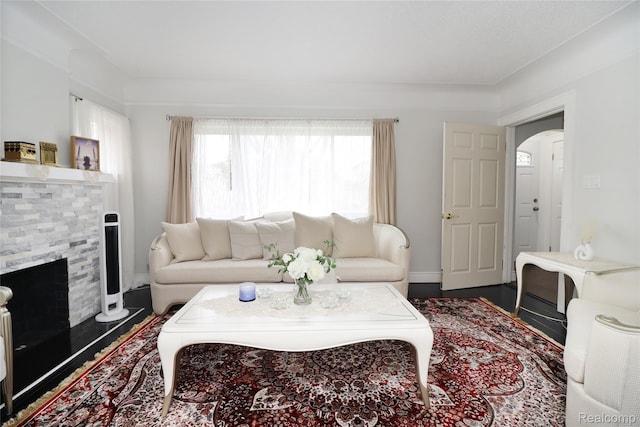7524 Williamson St, Dearborn, MI 48126 - living area featuring a tile fireplace and arched walkways