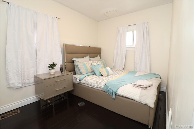 7524 Williamson St, Dearborn, MI 48126 - bedroom featuring baseboards and dark wood-style floors