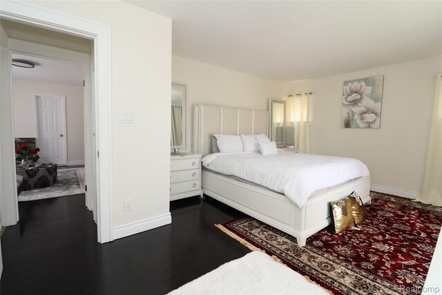 7524 Williamson St, Dearborn, MI 48126 - bedroom with dark wood finished floors and baseboards