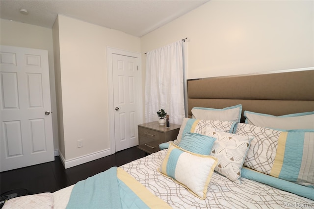 7524 Williamson St, Dearborn, MI 48126 - bedroom with dark wood-type flooring and baseboards