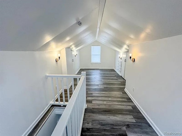 2454 Bellevue St, Saginaw, MI 48601 - bonus room featuring lofted ceiling, dark wood finished floors, and baseboards