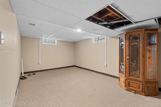 13522 Callender St, Southgate, MI 48195 - below grade area with carpet flooring, plenty of natural light, and a drop ceiling