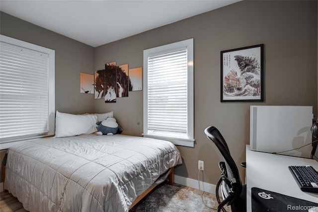 23069 Violet St, Farmington, MI 48336 - bedroom with a desk and baseboards