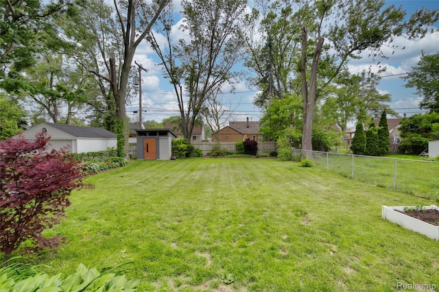 23069 Violet St, Farmington, MI 48336 - fenced backyard featuring a storage unit